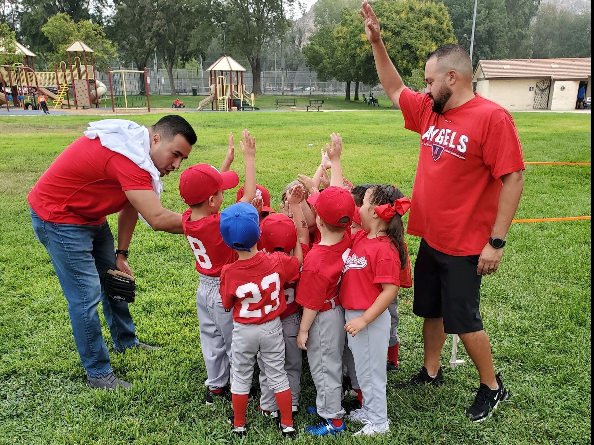 Pee Wee T-Ball team high five